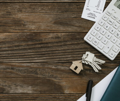 Real estate wooden table finance and budgeting concept