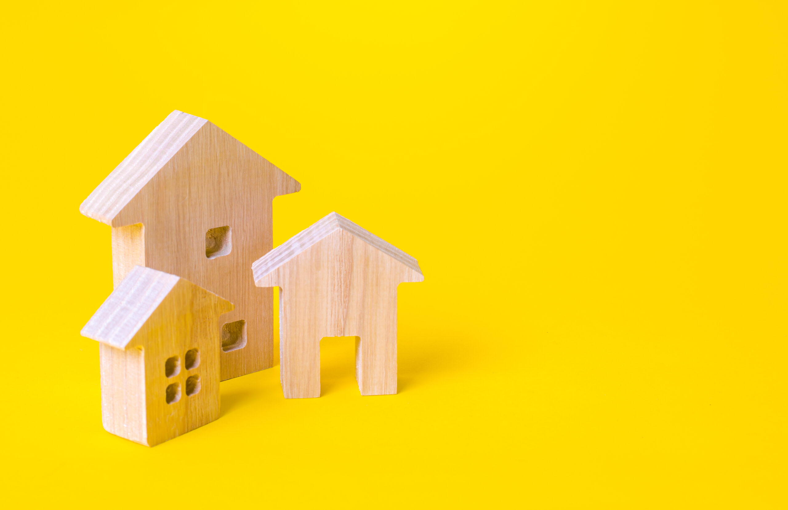 Residential buildings on a yellow background. Buying and selling real estate. Renting housing, Real Estate Agent services. Renovation and home improvement. Mortgage loan. Building maintenance. Residential buildings on a yellow background. Buying and selling real estate. Renting housing, Real Estate Agent services. Renovation and home improvement. Mortgage loan. Building maintenance.