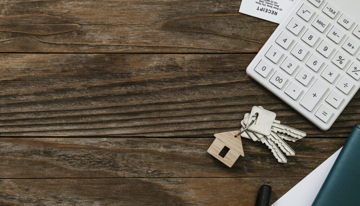 Real estate wooden table finance and budgeting concept