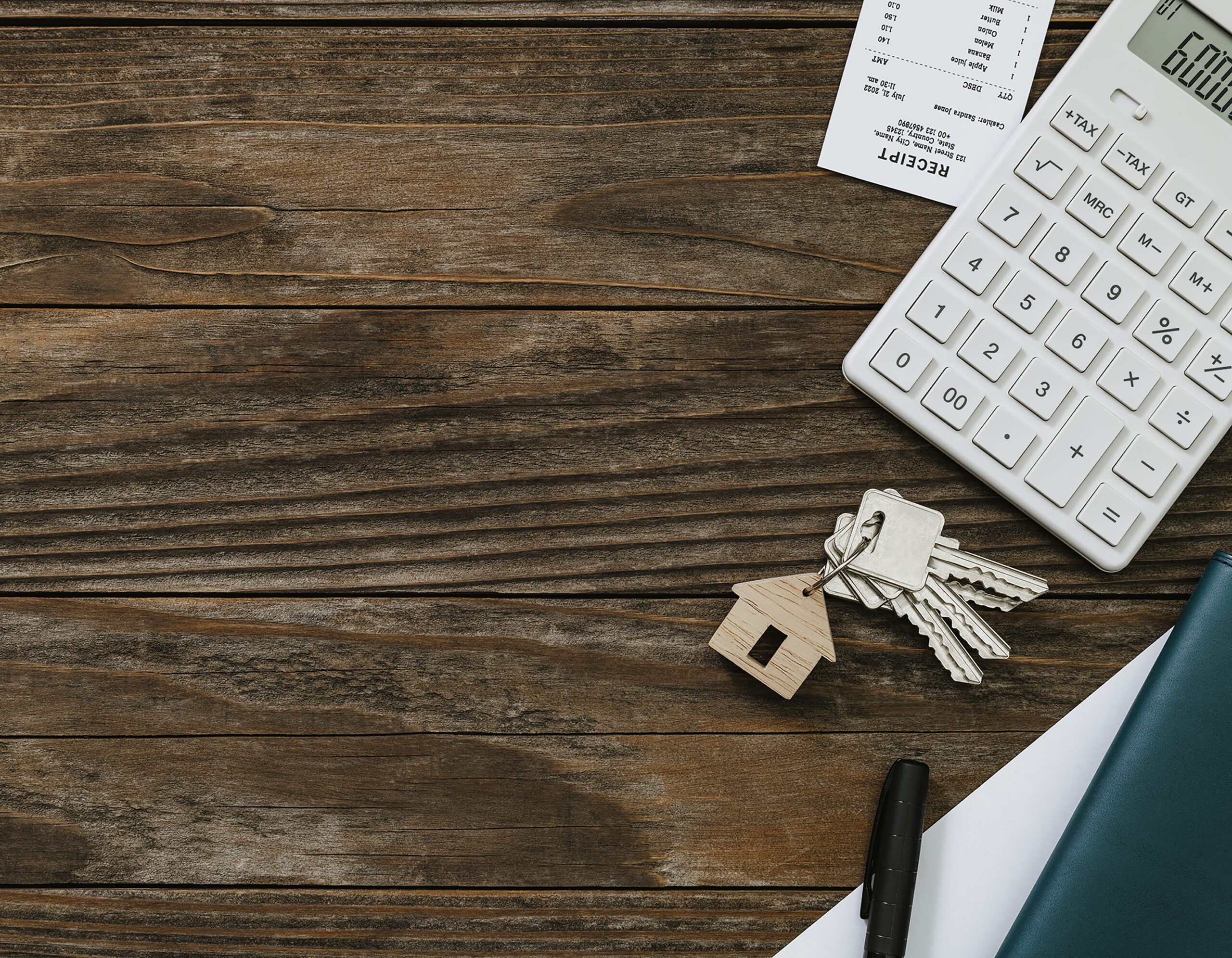 Real estate wooden table finance and budgeting concept